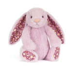 Front view of Jellycat Blossom Thistlepop Luxe Bunny Original with soft pastel purple fur, floral patterned ears and matching blossom print paw pads.