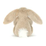 Rear view of Jellycat Oat Flufflet Bunny highlighting soft oat beige plush, long ears and fluffy cream tail.
