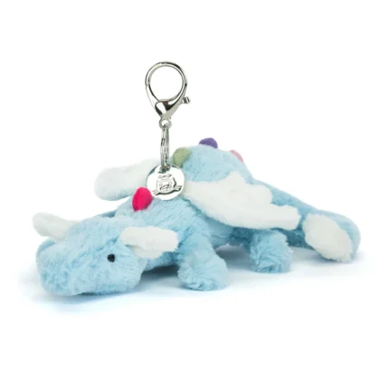 Front view of Jellycat Sky Dragon Bag Charm with baby blue fur, soft white wings, rainbow spikes and silver clasp attachment.