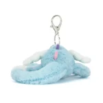 Rear view of Jellycat Sky Dragon Bag Charm highlighting soft baby blue plush, rainbow spikes and silver keyring attachment.